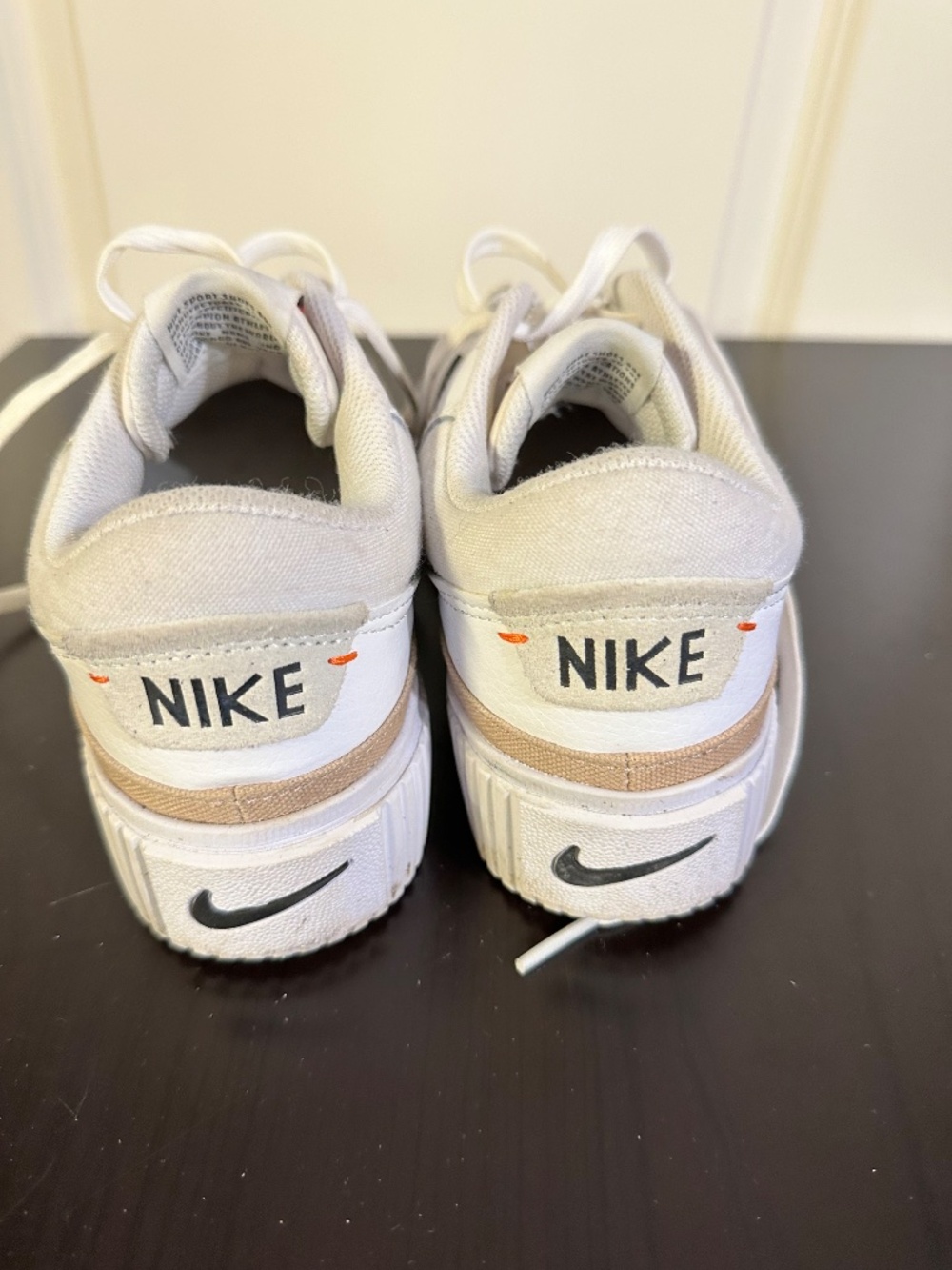 Nike Court Legacy Lift sneakers feature a prominent platform sole and a white le - Picture 4 of 7